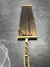 Load image into Gallery viewer, Bracelet manchette large chaîne en laiton brut et émail noir créateur Khara Tuki Paris