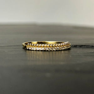 Bague en laiton doré, strass de Swarovski sur 2 rangs. Taille Unique