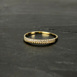 Bague en laiton doré, strass de Swarovski sur 2 rangs. Taille Unique