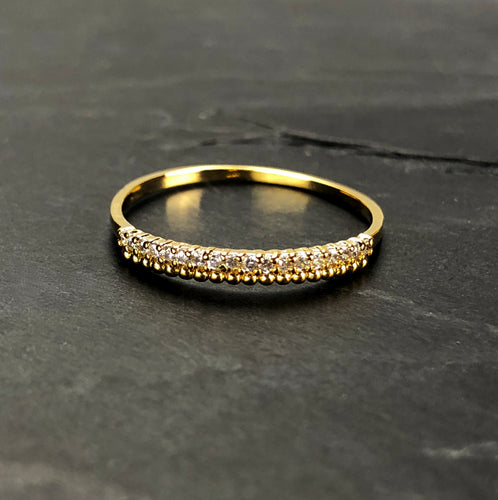 Bague en laiton doré, strass de Swarovski sur 2 rangs. Taille Unique